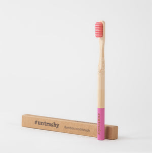 Pink eco-friendly plastic-free bamboo toothbrush